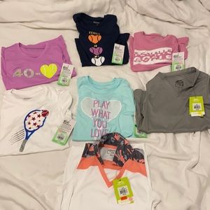 Assortment of children’s athletic shirts